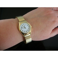 Ladies Gold Watch Stretch Band with Clear White Dial by Sekonda
